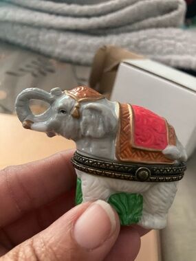 White and Gold Elephant Decorative Sculpture with Red Saddle